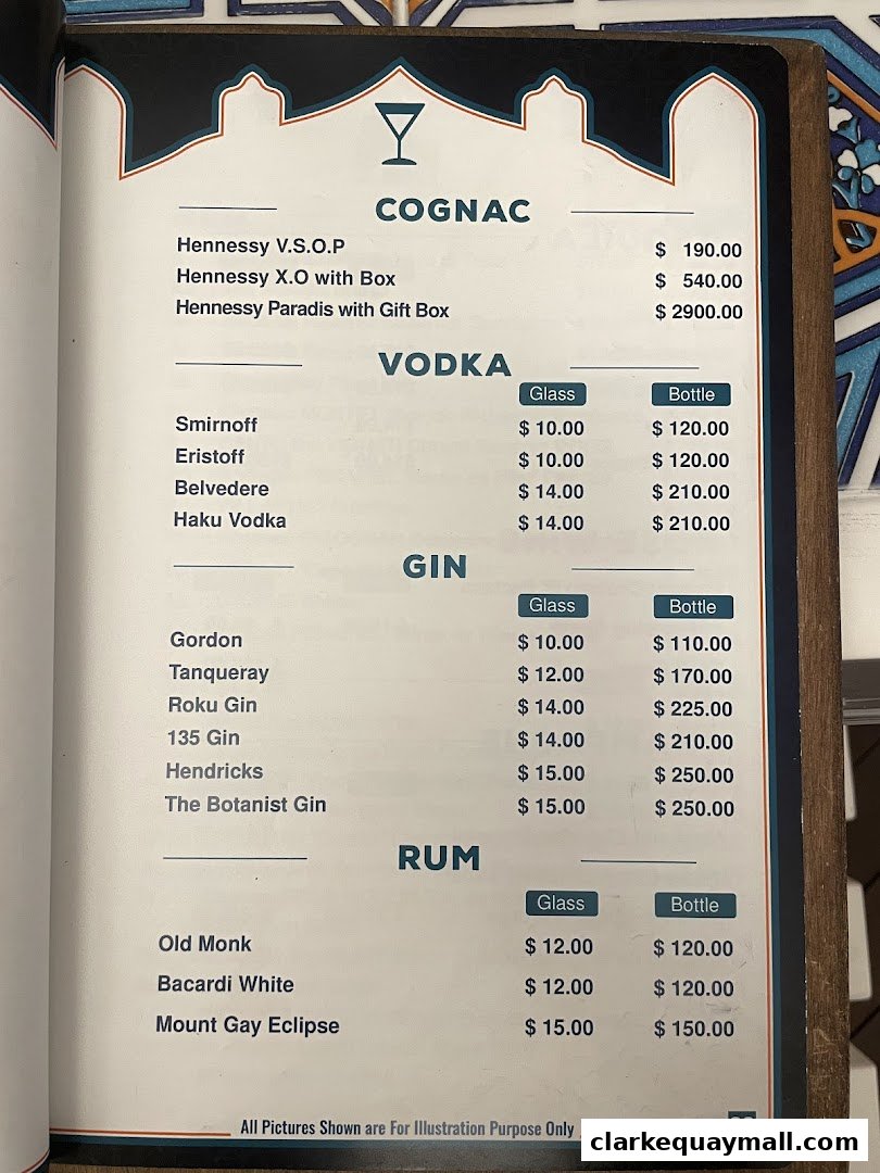 A menu page displaying a selection of cognacs, vodkas, gins, and rums with prices.