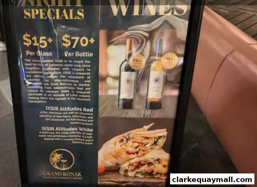 A menu board for Grand Konak Turkish and Lebanese Cuisine, featuring wine specials and descriptions.