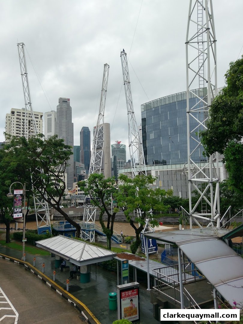 The GX-5 Extreme Swing attraction with city skyline in the background.