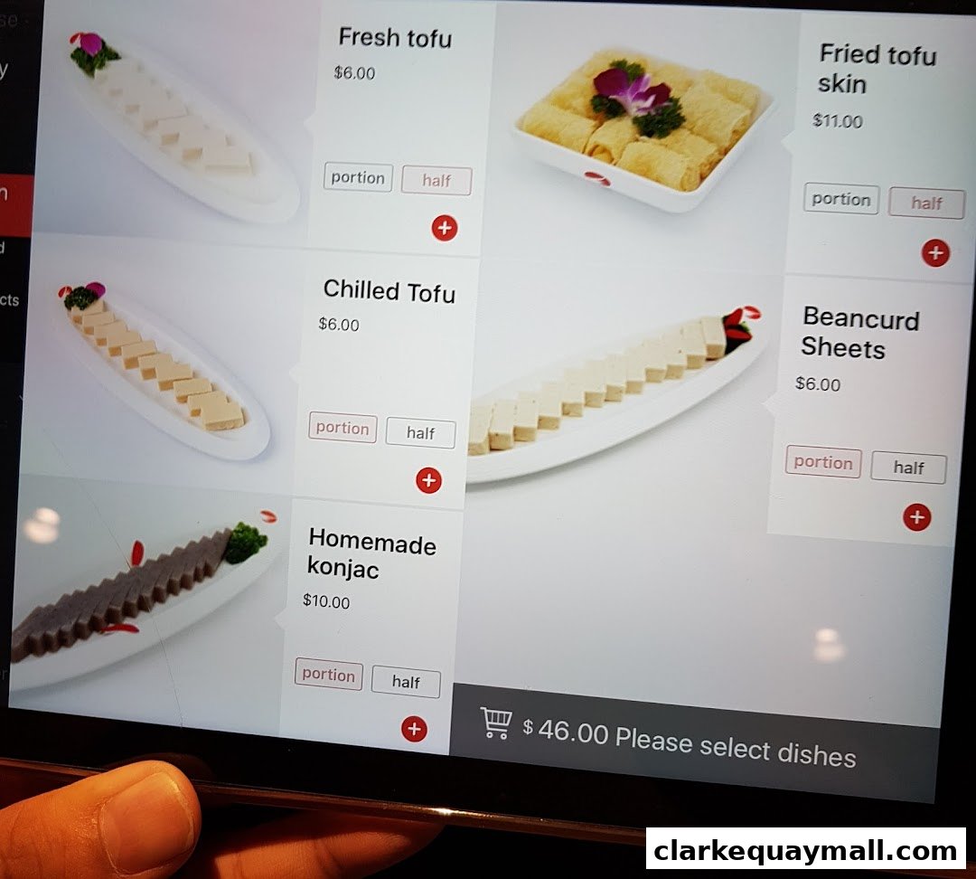 A digital menu displaying various tofu and konjac dishes for hot pot.
