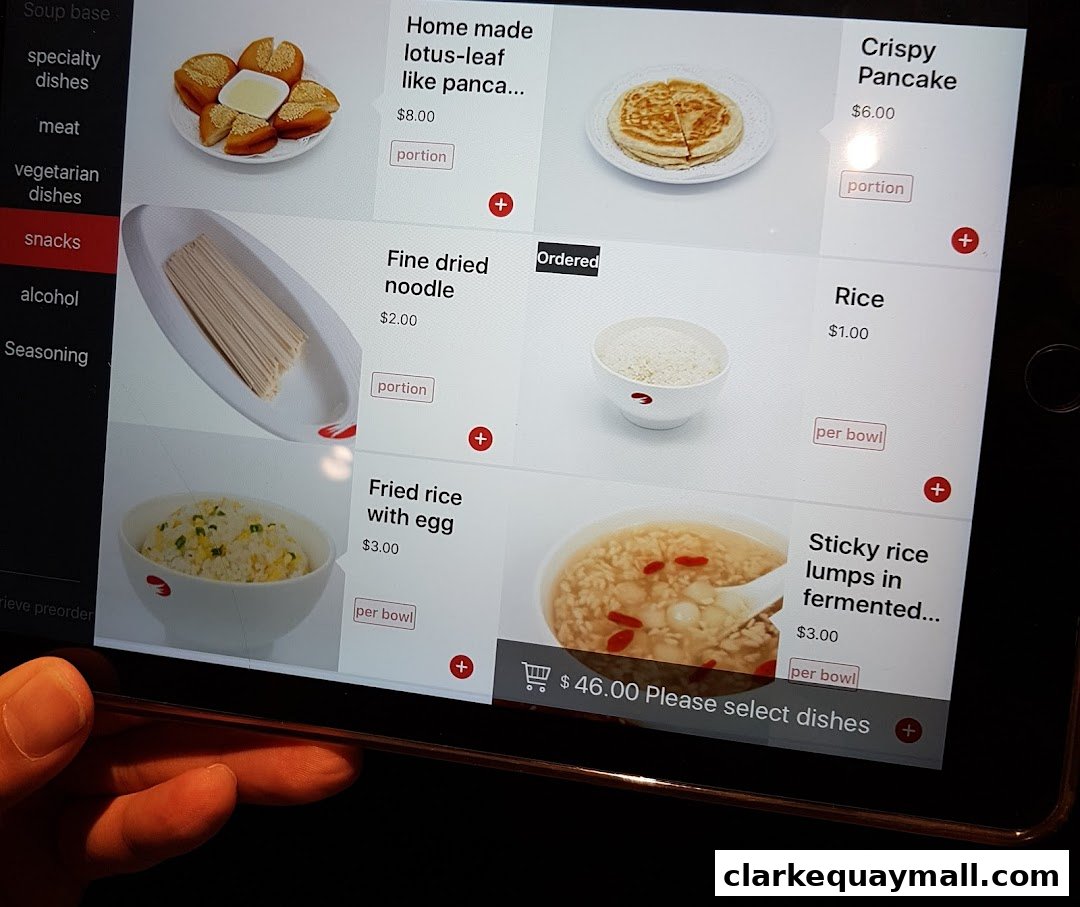 A tablet screen displaying a digital menu for Haidilao Hot Pot with various food items and prices.