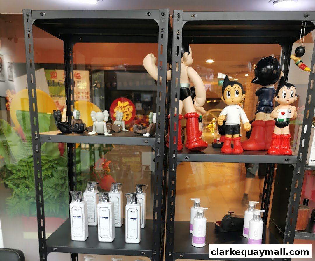 Shelves display collectible figures and bottles of hair products, with a reflection of the shop interior.
