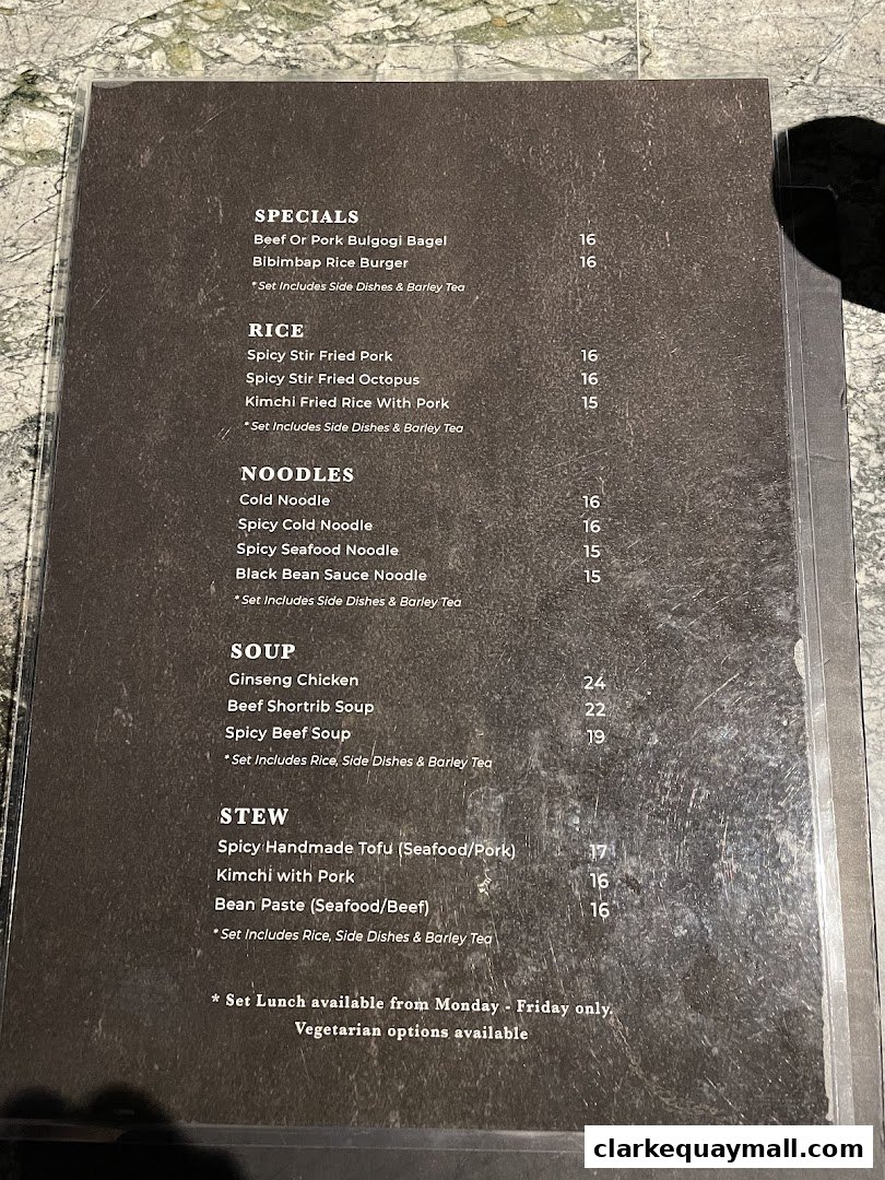 A menu from Hanjip Korean Grill House featuring specials, rice, noodles, soup, and stew dishes.