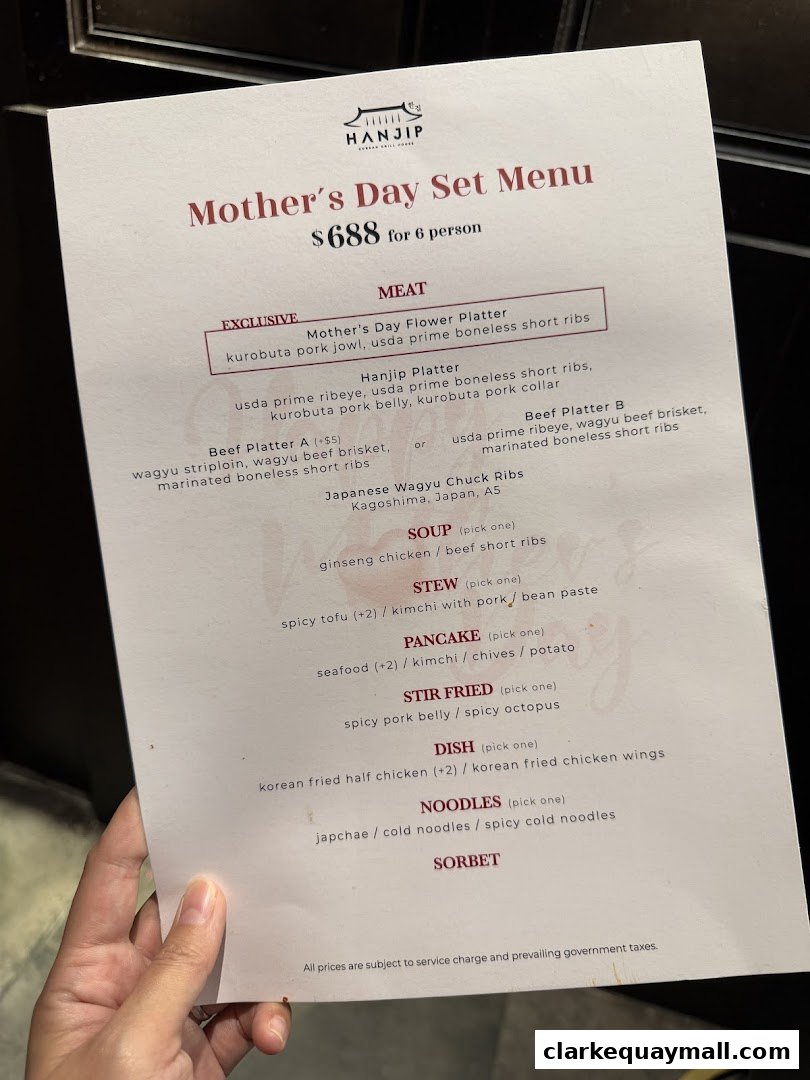 A hand holds a Mother's Day Set Menu from Hanjip Korean Grill House.
