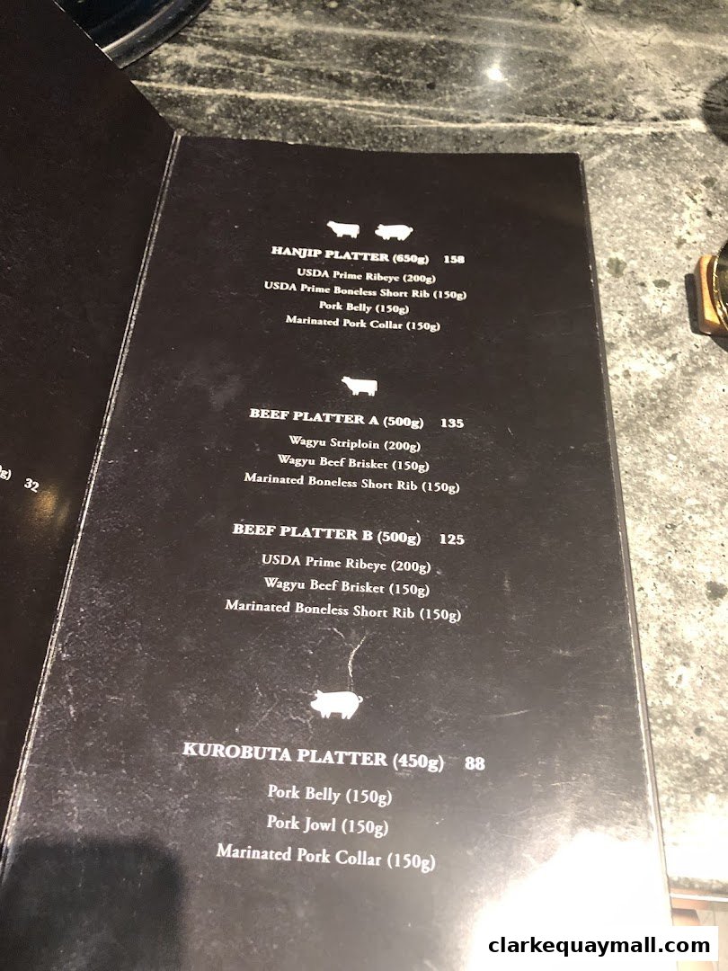 A menu from Hanjip Korean Grill House featuring various meat platters and their ingredients.