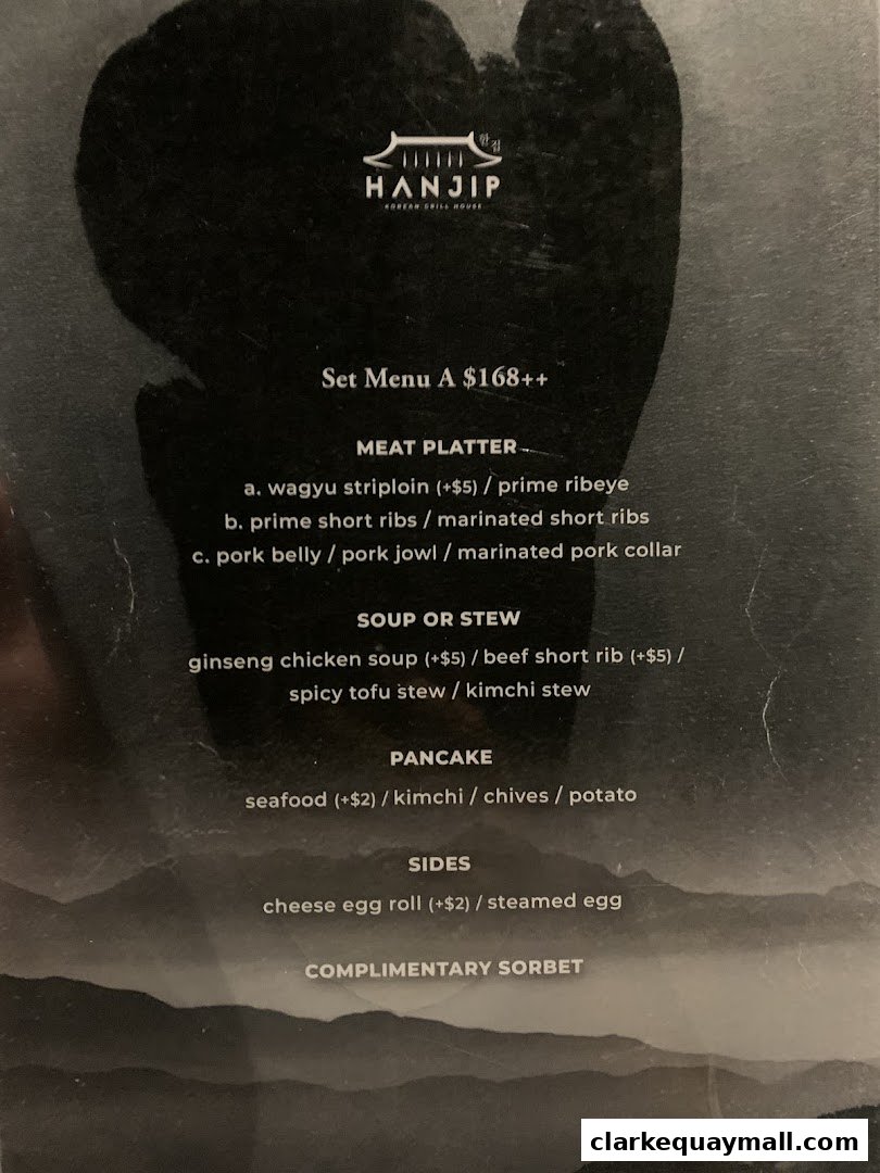 A menu for Hanjip Korean Grill House featuring Set Menu A with meat platters, soup, pancake, and sides.