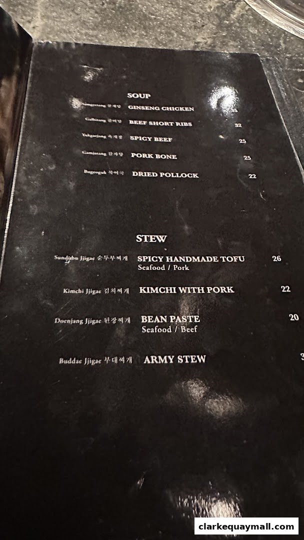 A menu from Hanjip Korean Grill House featuring soups and stews with prices.