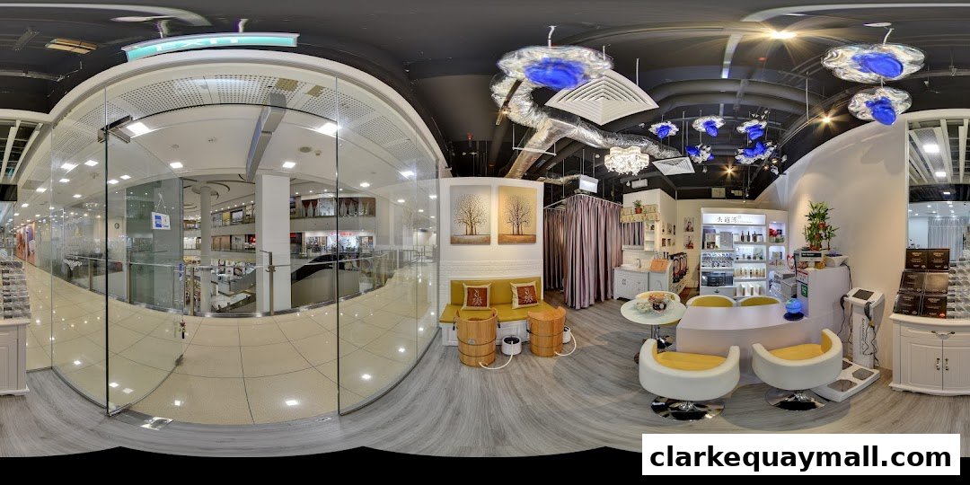 Interior view of a wellness and beauty shop with seating, product displays, and treatment equipment.