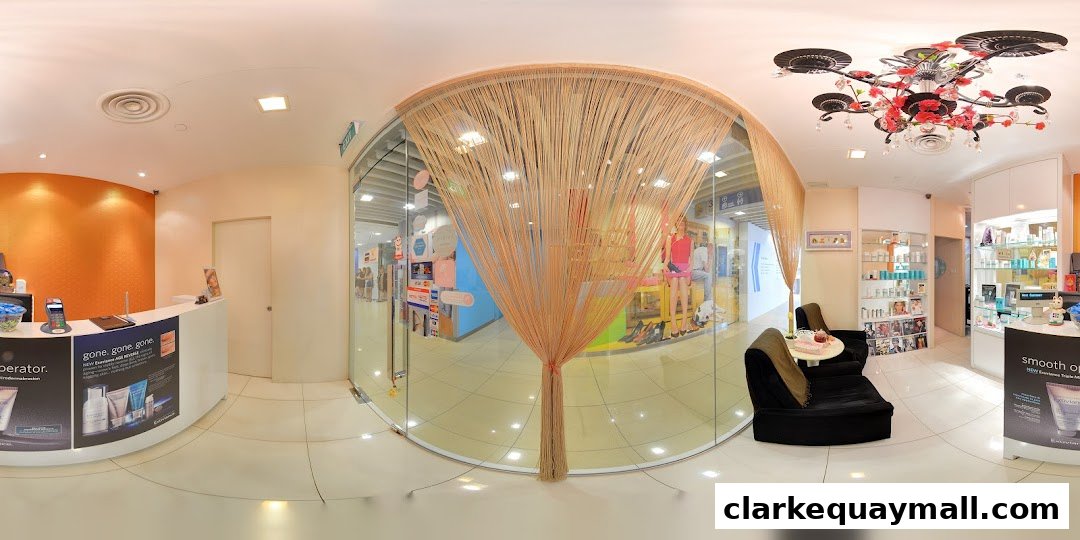 Interior view of a modern wellness and beauty shop with a reception desk and seating area.
