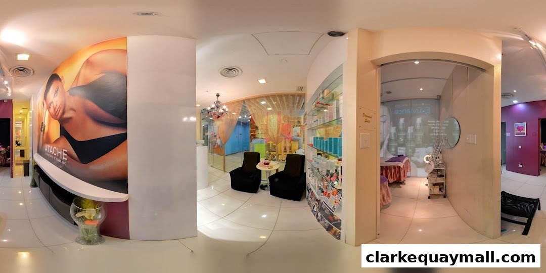 Interior view of a modern beauty salon with treatment rooms and product displays.