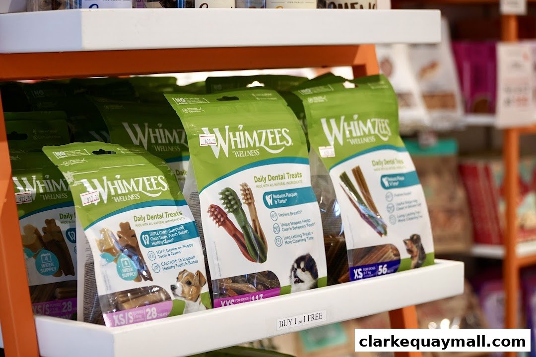 Shelves stocked with bags of Whimzees dog dental treats in various sizes and packaging.