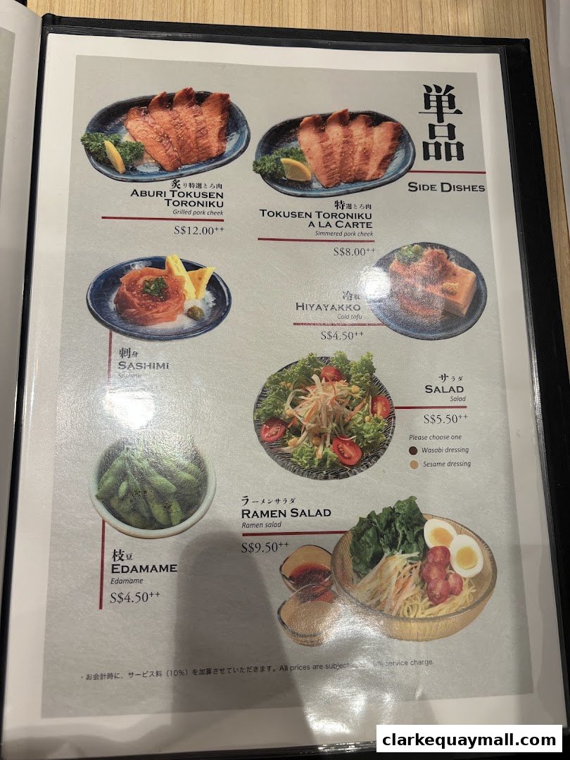 A menu page from Hokkaido Ramen Santouka featuring various side dishes and salads.