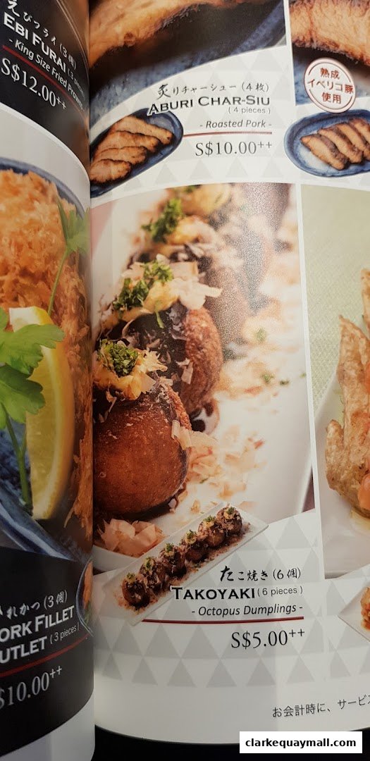 A menu page showcasing various Japanese dishes including Ebi Furai, Aburi Char-Siu, and Takoyaki.
