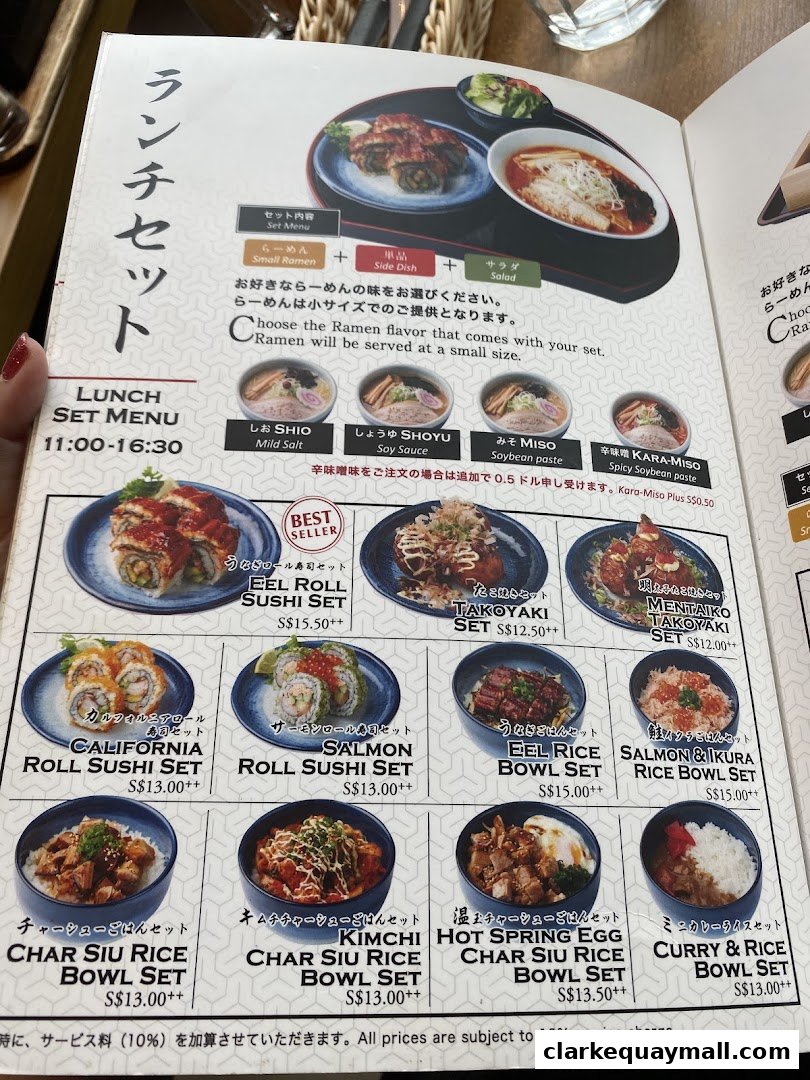 A menu for Hokkaido Ramen Santouka featuring lunch sets with ramen, sushi, and rice bowls.