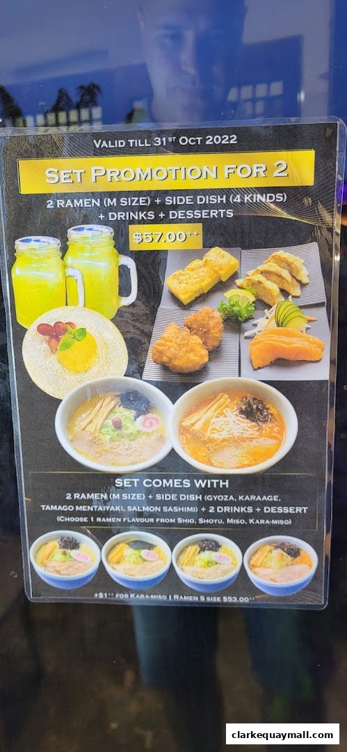 A promotional menu for a set for two, featuring ramen, side dishes, drinks, and dessert.