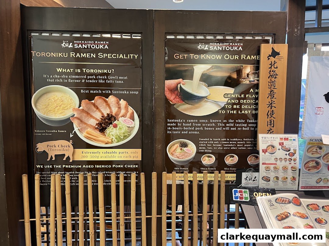 Informational posters and menus for Hokkaido Ramen Santouka, showcasing their Toroniku ramen specialty.