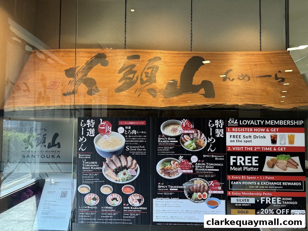 A menu display for Hokkaido Ramen Santouka, featuring various ramen dishes and a loyalty program.