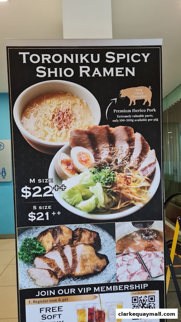 A promotional poster for Toroniku Spicy Shio Ramen featuring premium Iberico pork.