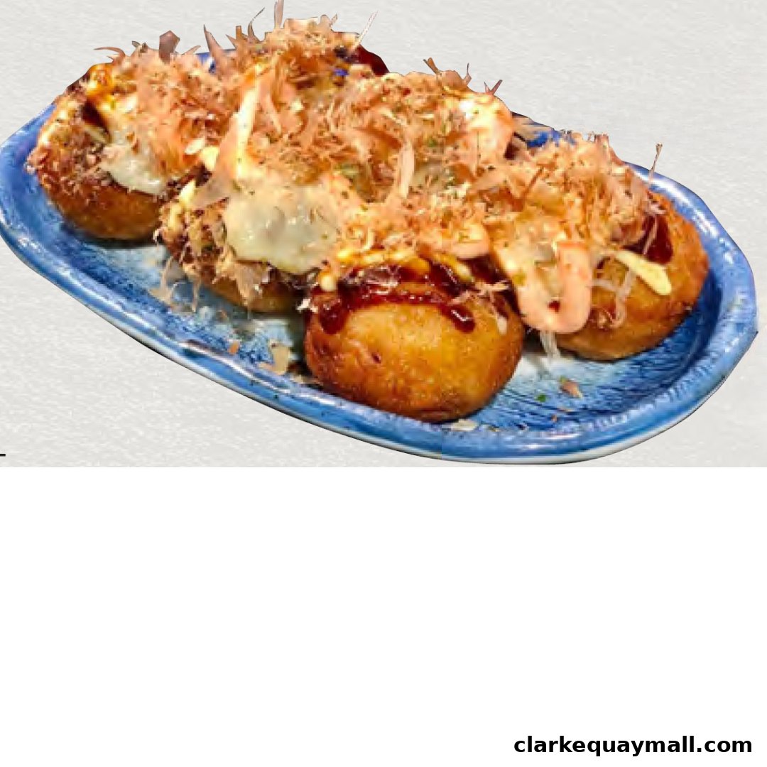 A plate of delicious takoyaki, a Japanese street food snack.