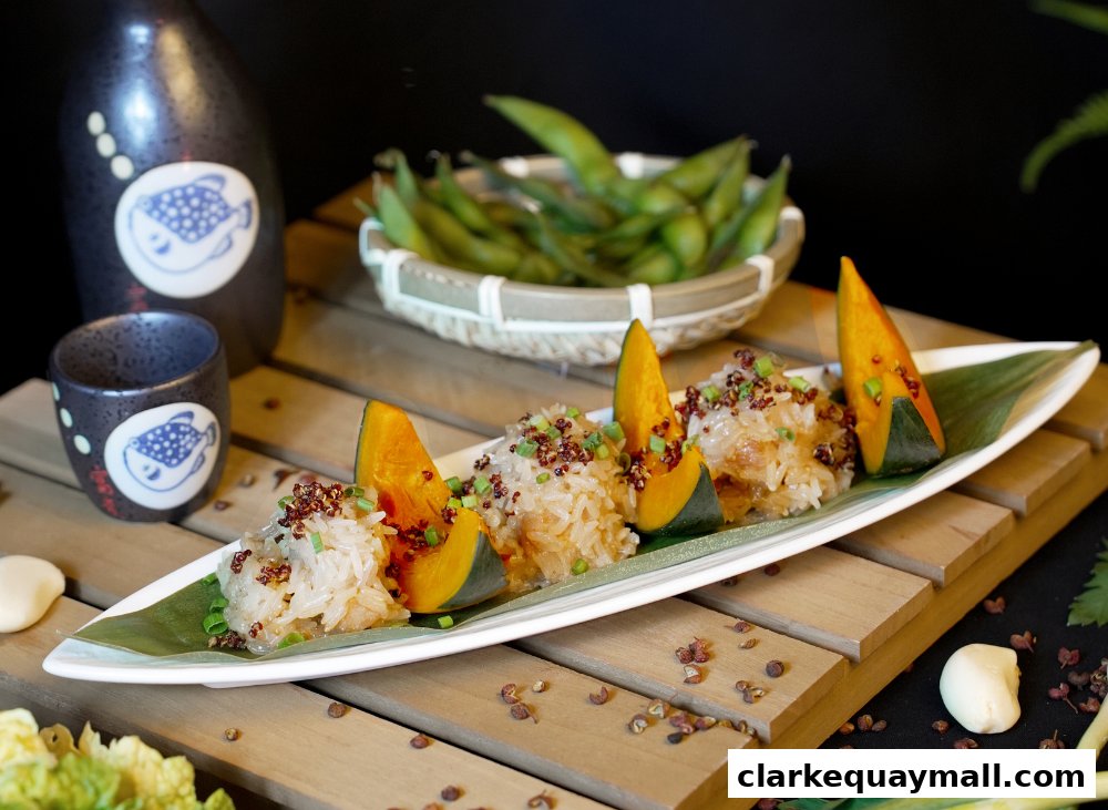 A plate of sticky rice with pumpkin slices and edamame in a basket.