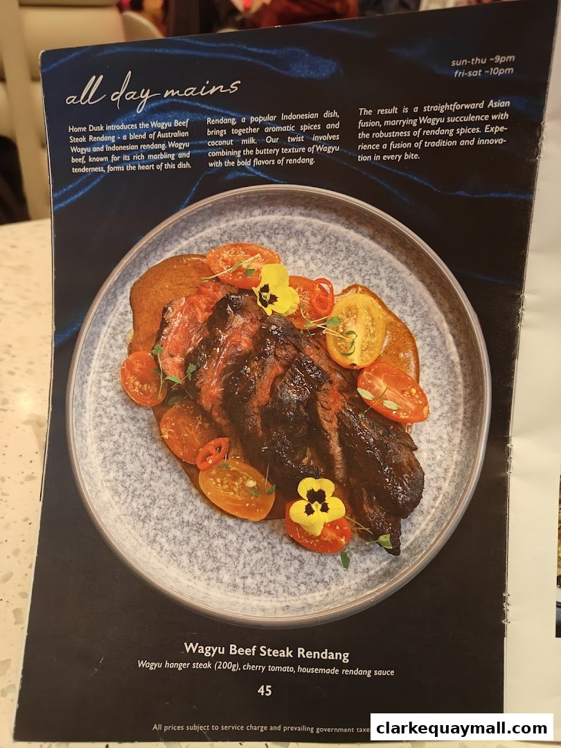 A menu item featuring Wagyu Beef Steak Rendang with description and price.
