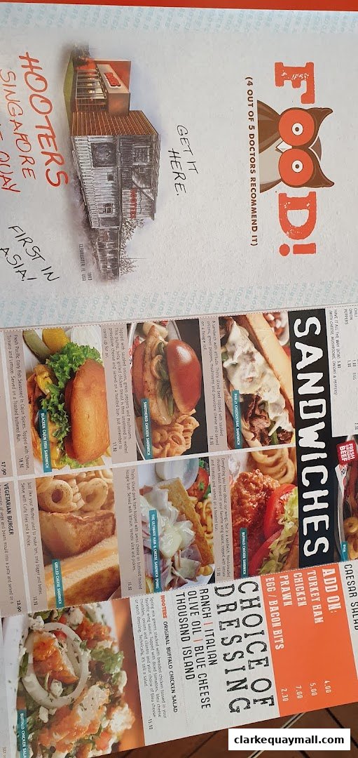 A Hooters menu featuring sandwiches, salads, and add-ons with enticing food photography.