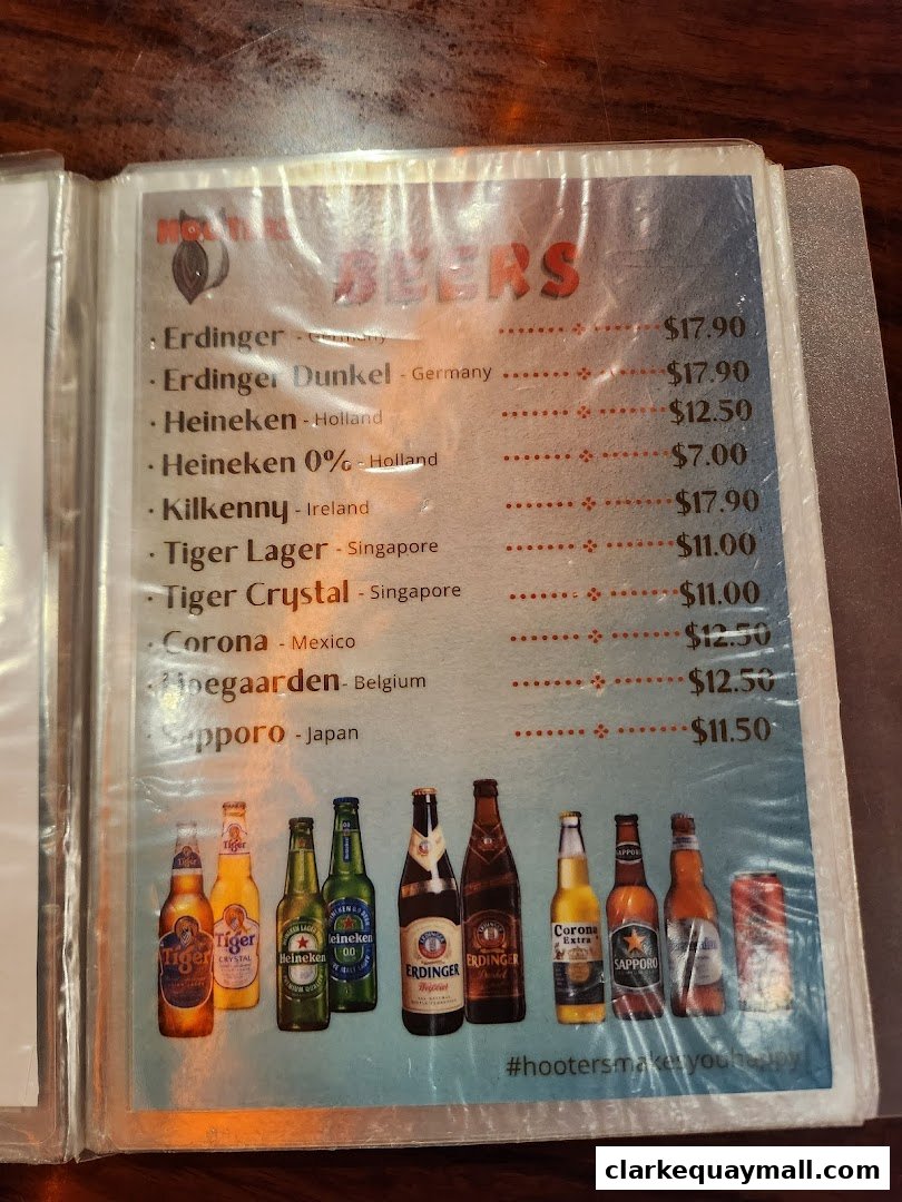 A menu page from Hooters featuring a selection of beers with their prices and origins.