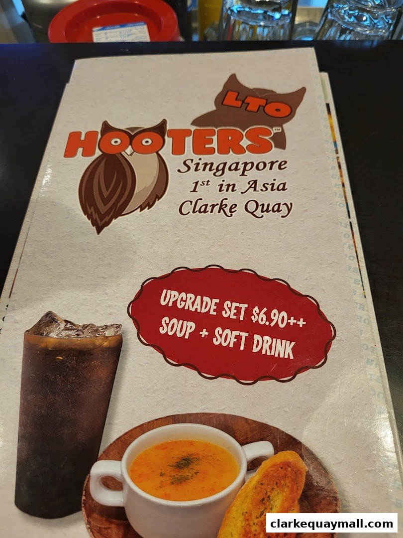 A Hooters menu featuring an upgrade set with soup and soft drink.