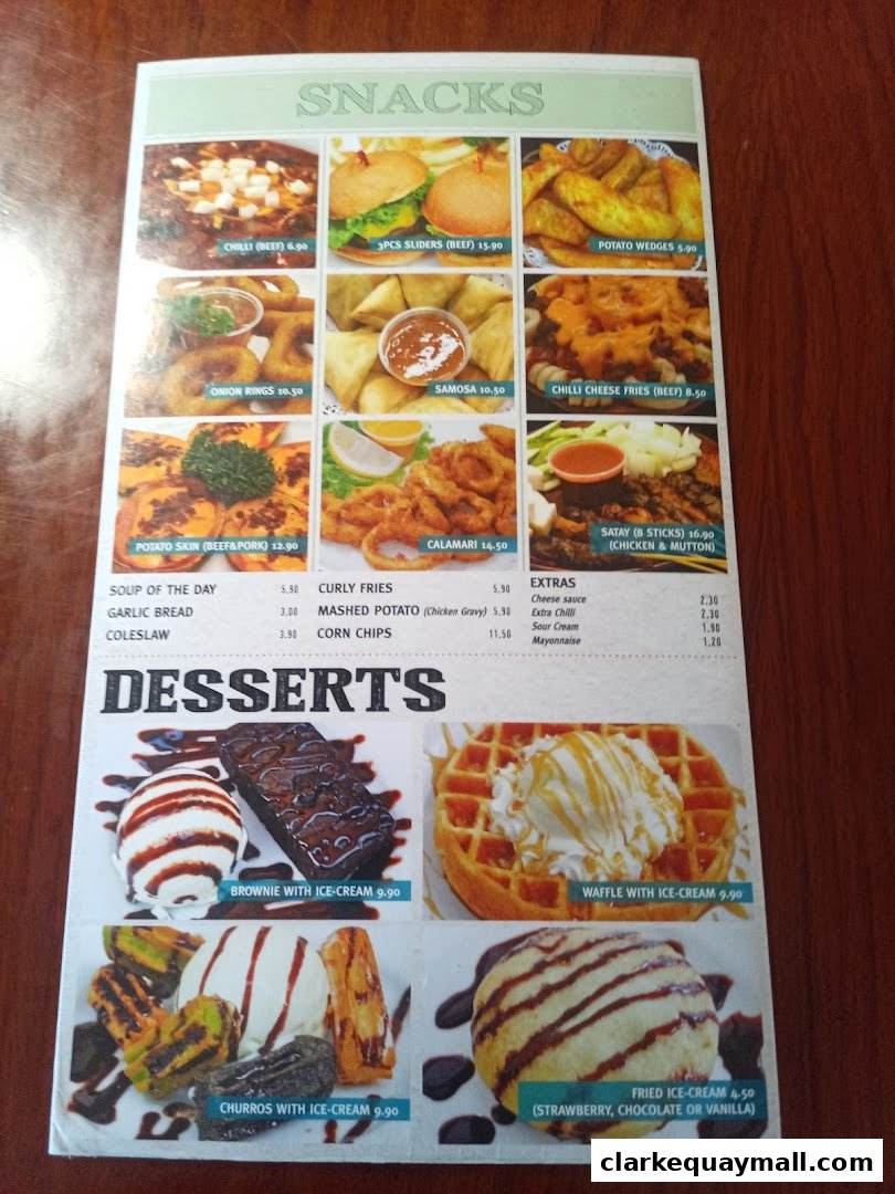 A menu featuring snacks like sliders, potato wedges, calamari, and desserts like brownies and waffles.