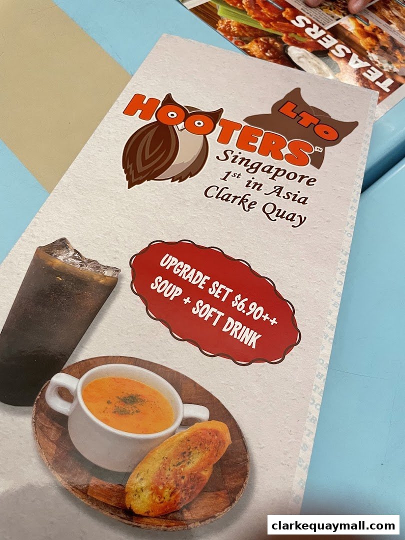 A Hooters menu featuring an upgrade set with soup and soft drink.