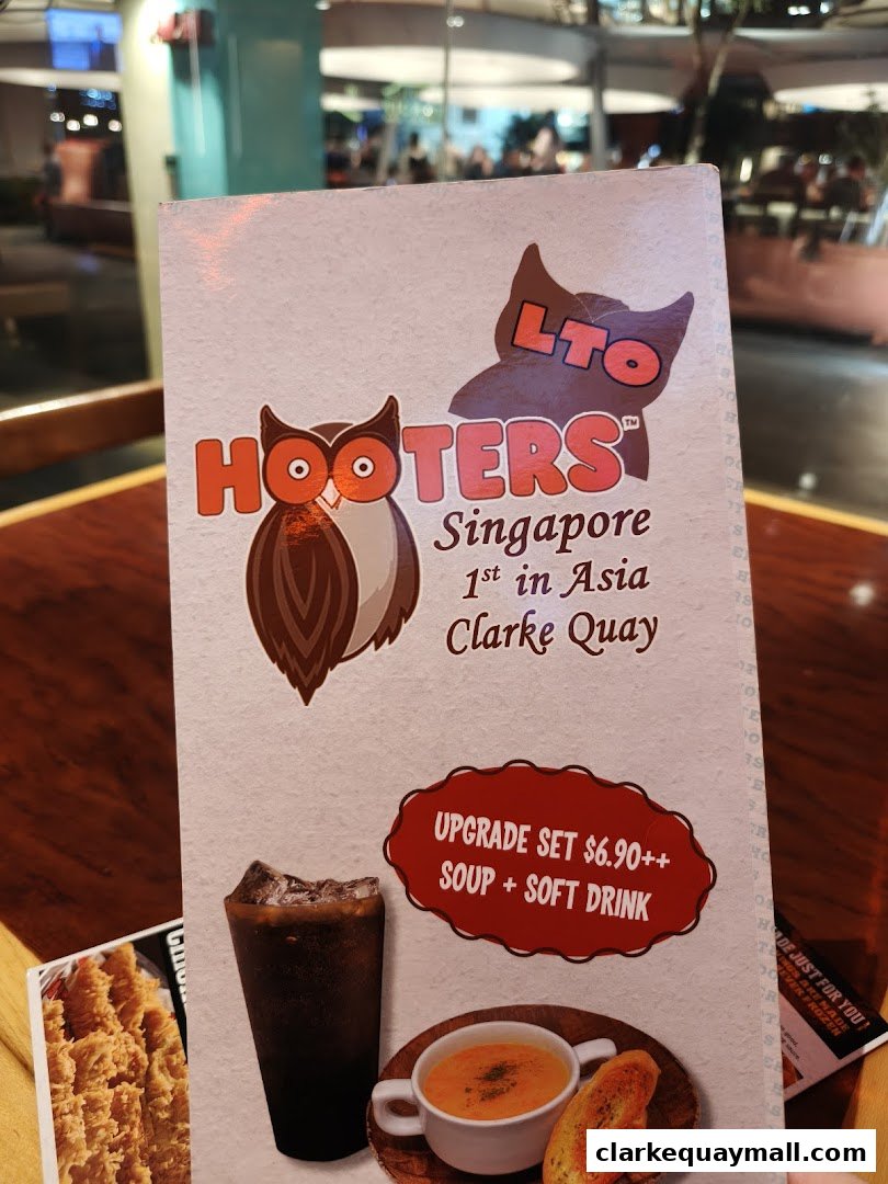 A Hooters menu featuring an upgrade set with soup and soft drink.