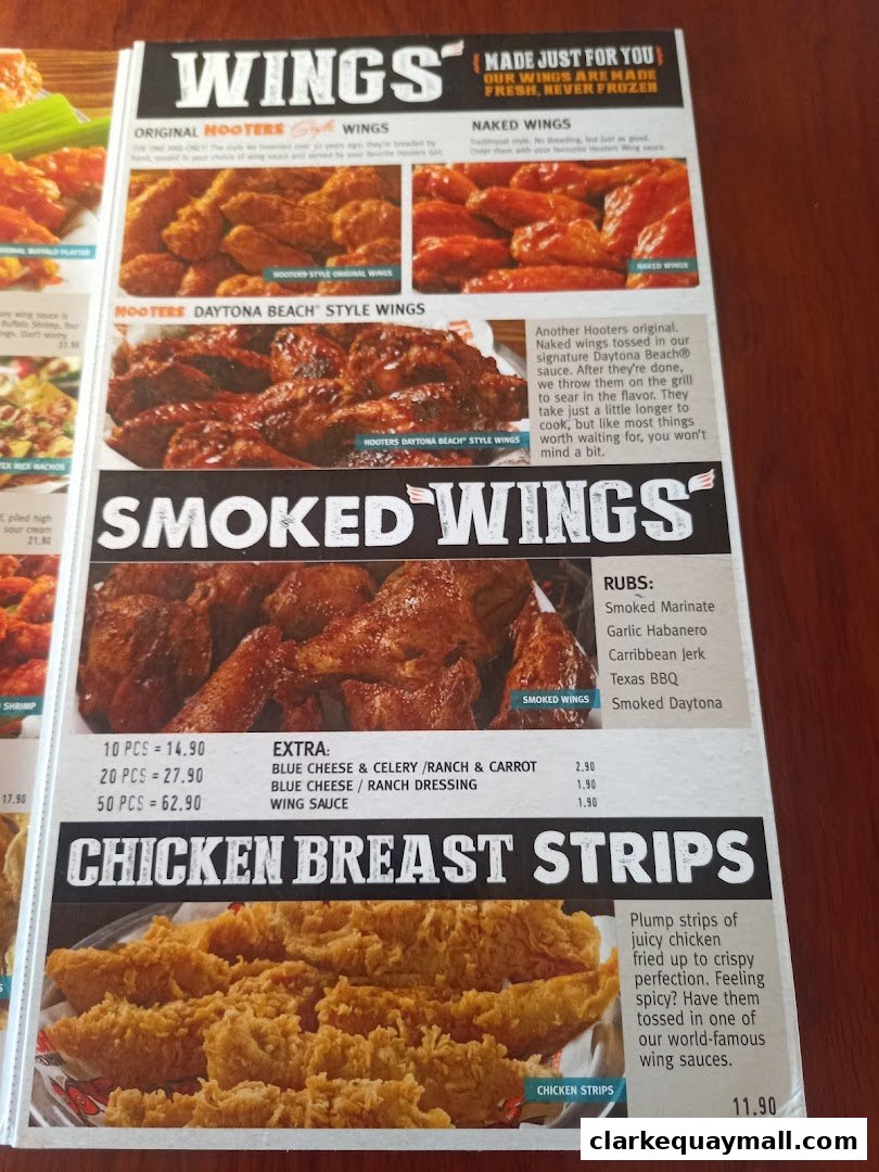 A Hooters menu showcasing various wing styles and chicken breast strips.
