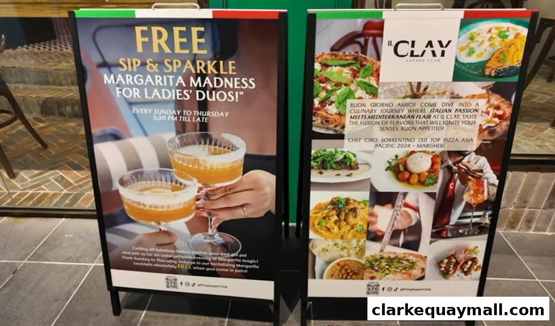 Two A-frame signs advertising a free margarita offer and Italian cuisine at IL CLAY Supper Club.