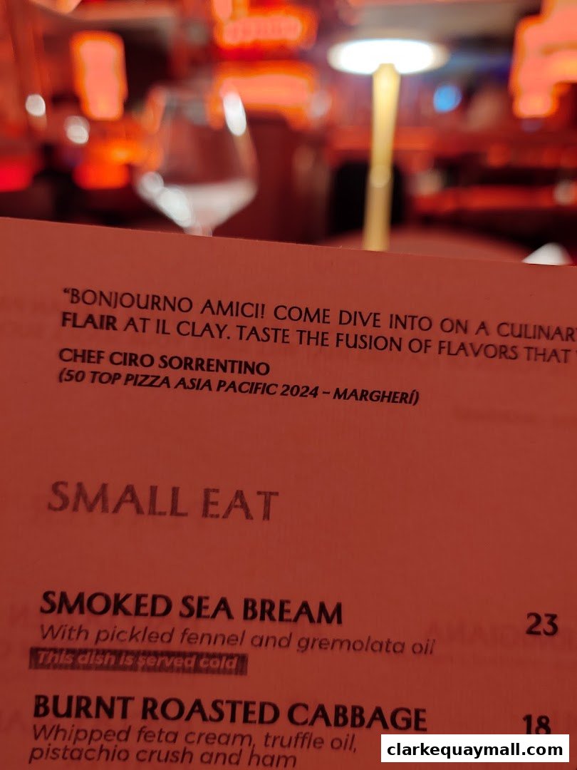 A menu from IL CLAY featuring 'Small Eat' dishes like Smoked Sea Bream and Burnt Roasted Cabbage.