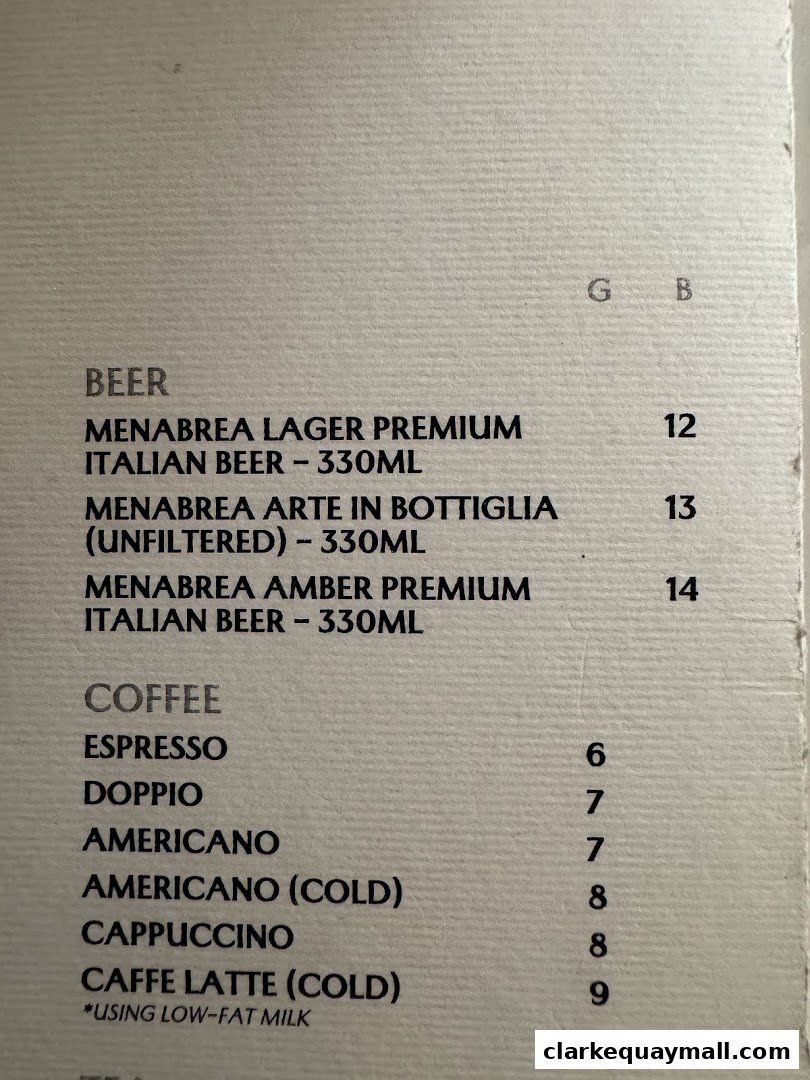 A menu featuring beers and coffees with prices.