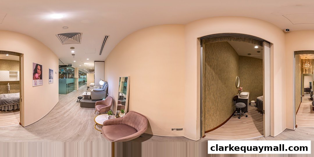 Interior view of a beauty salon with treatment rooms, pedicure chairs, and seating areas.
