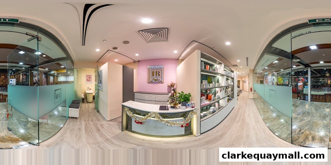 Interior view of the Into Beauty shop, showcasing the reception area and product displays.