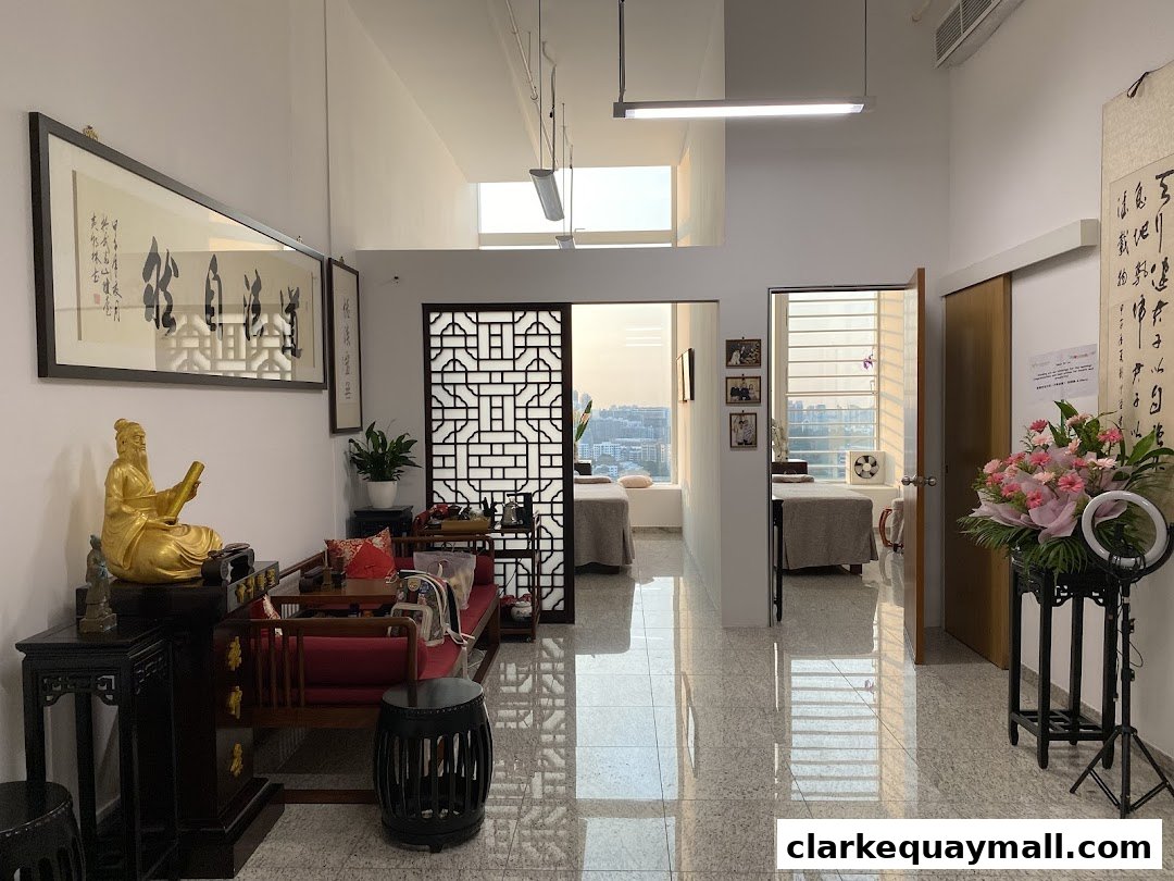 Interior of a health management shop with traditional decor and treatment beds.