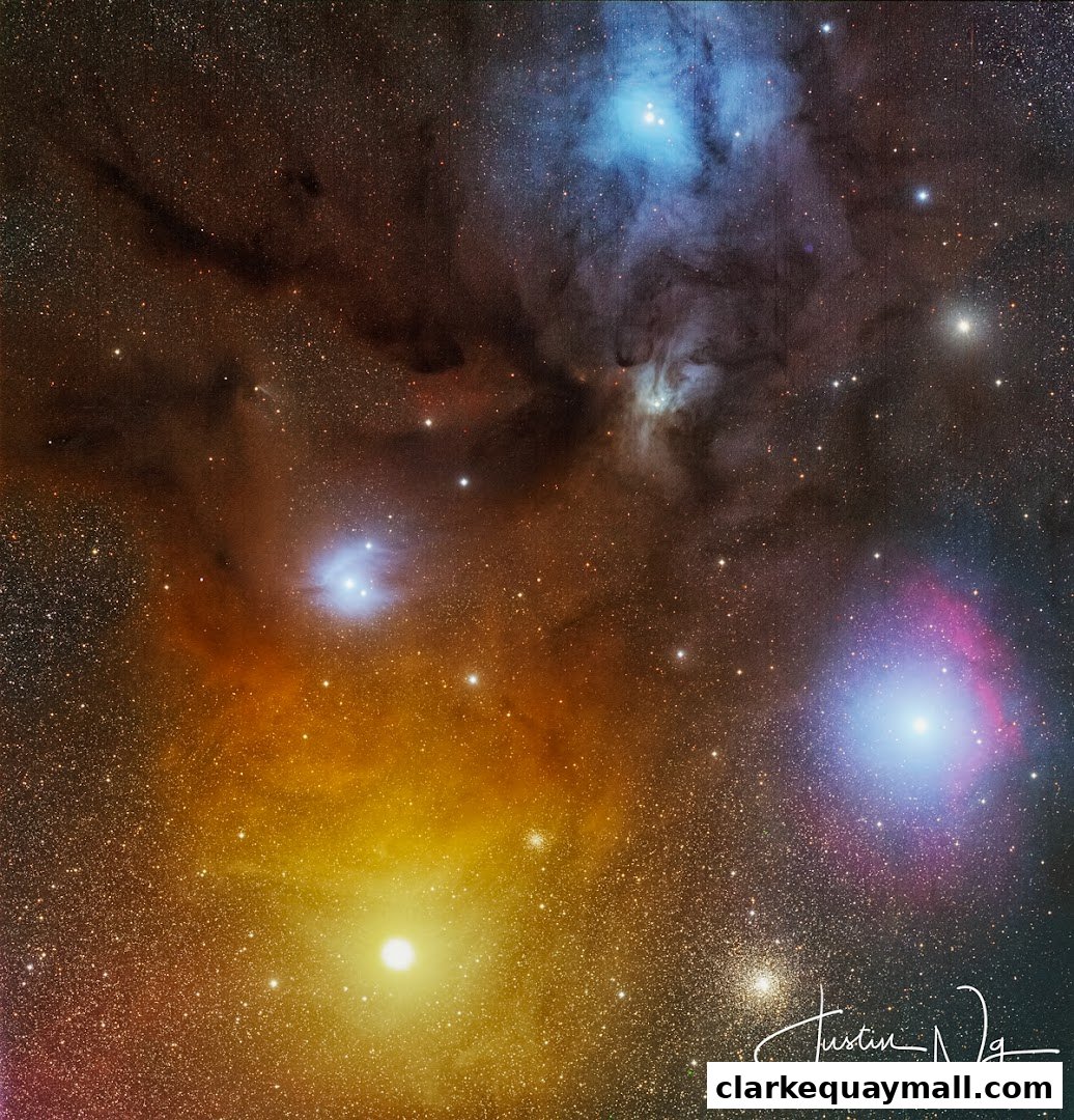 A stunning astrophotograph captures a vibrant nebula with glowing stars and cosmic dust.
