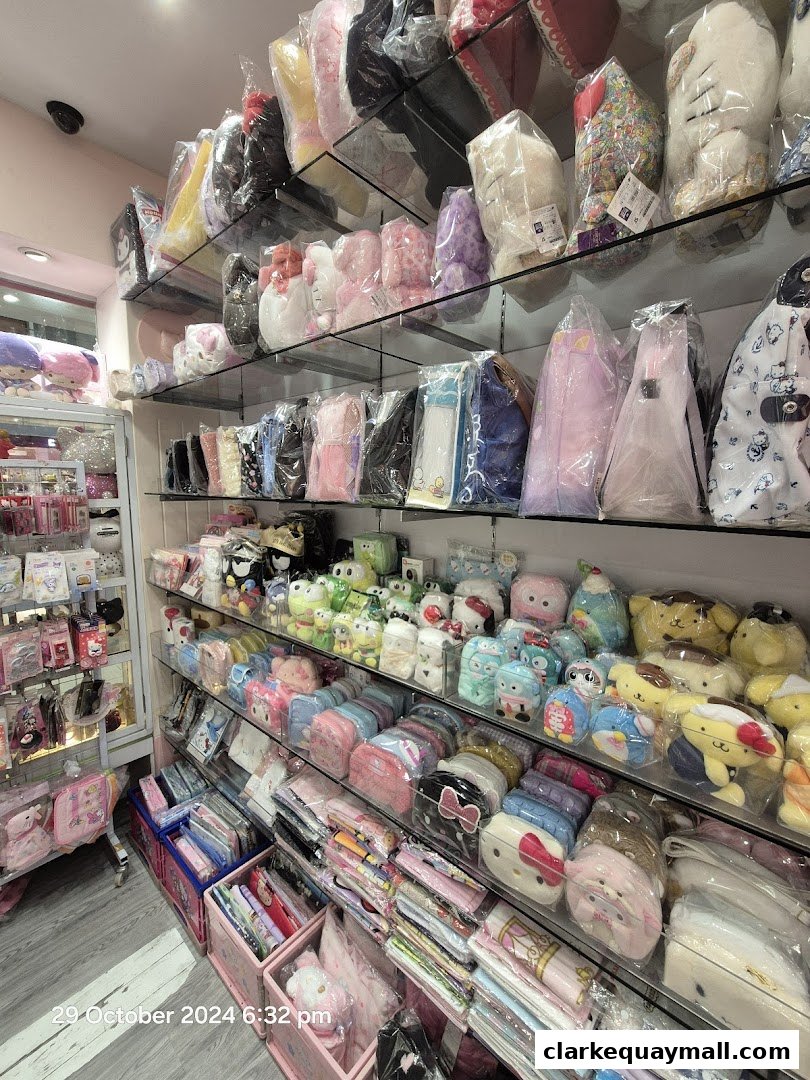 A shop interior filled with shelves of cute plush toys, bags, and accessories.