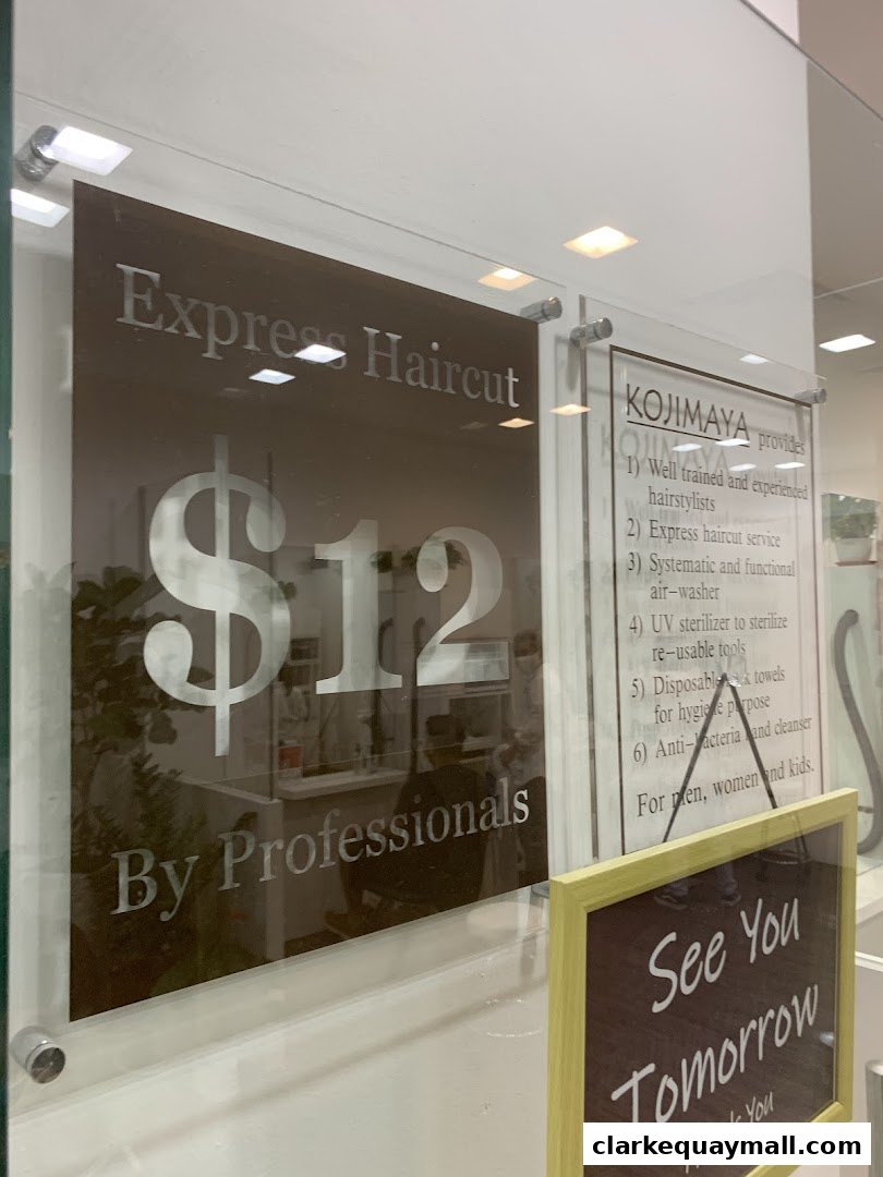 A shop window displays an express haircut service for $12 by professionals.