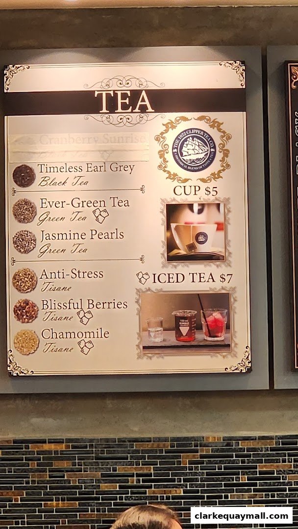 A menu board displaying various teas offered by The 1872 Clipper Tea Co.