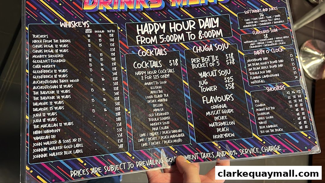 A drinks menu featuring whiskies, cocktails, soju, soft drinks, and shooters with prices.