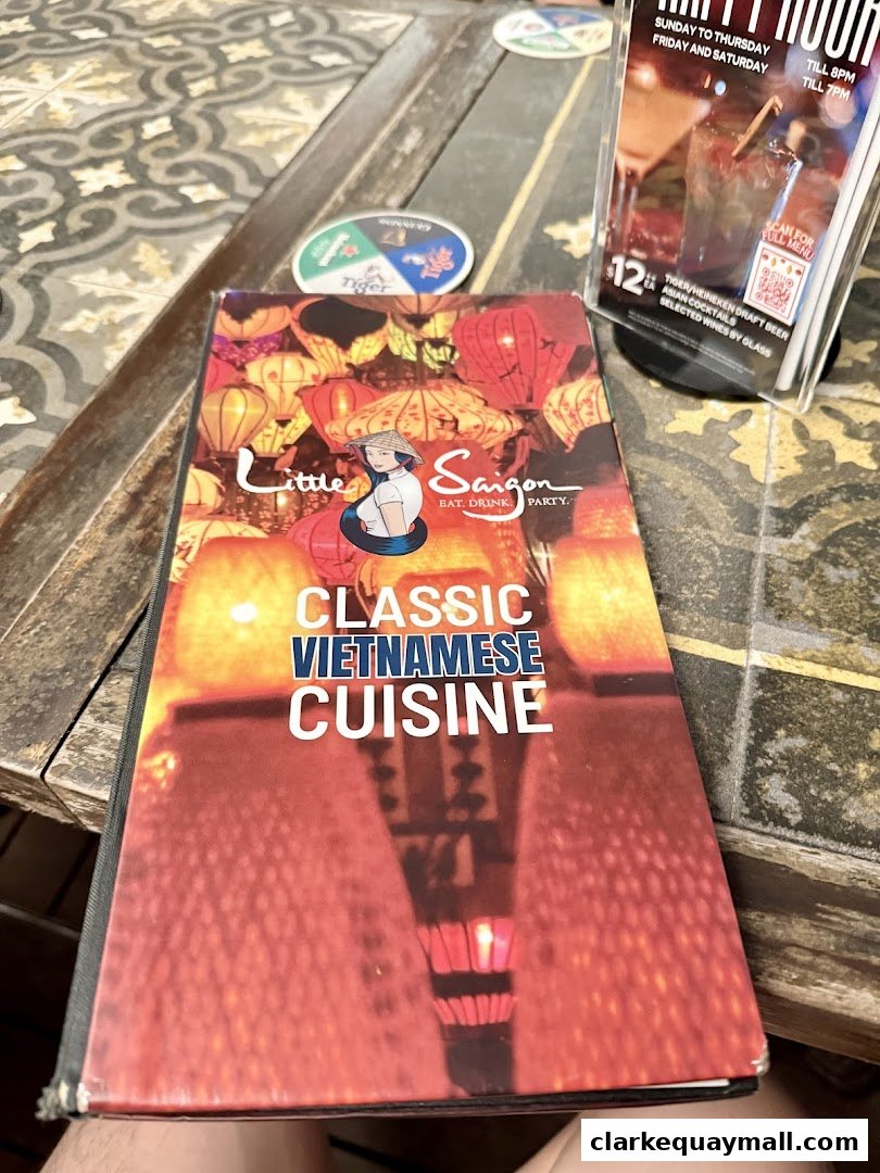 A menu for Little Saigon restaurant featuring classic Vietnamese cuisine.