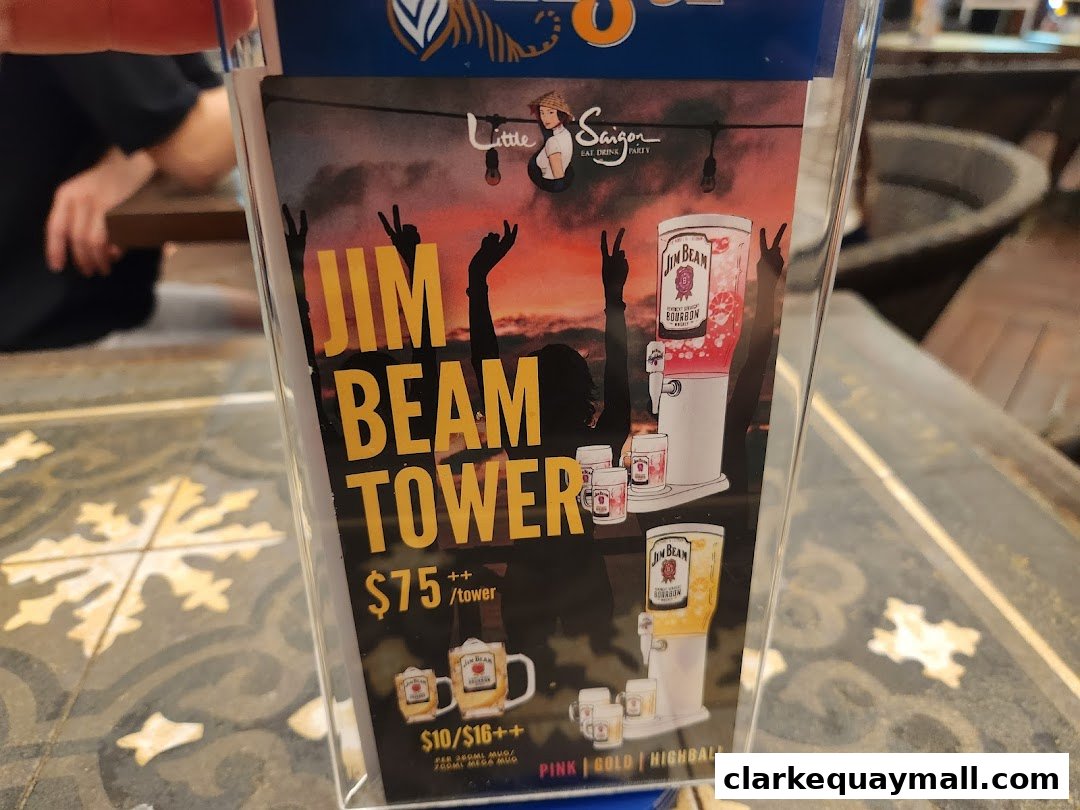 A promotional sign for a Jim Beam Tower drink at Little Saigon.