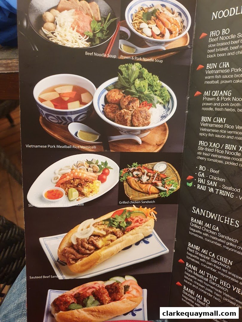 A menu featuring various Vietnamese noodle dishes and sandwiches with appealing food photography.