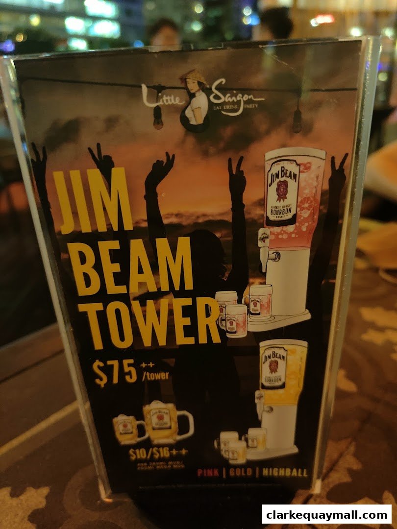 A promotional sign for Jim Beam towers at Little Saigon.