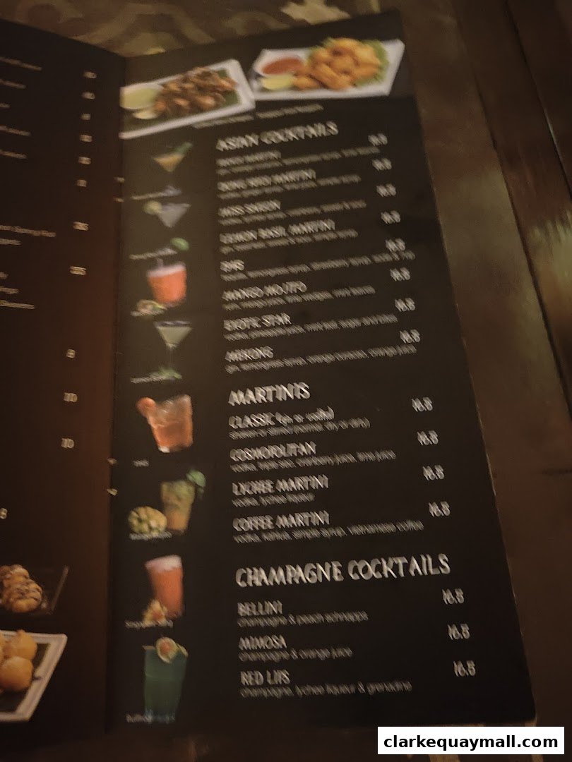 A menu featuring Asian cocktails, martinis, and champagne cocktails with prices.