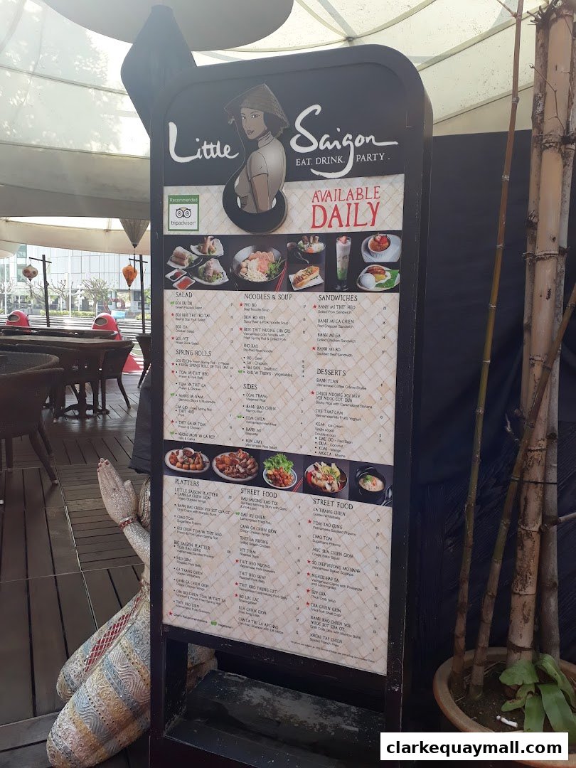 A menu board for Little Saigon restaurant, featuring Vietnamese dishes and drinks.