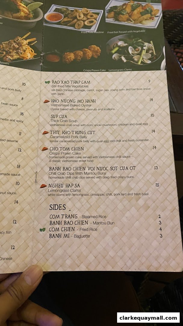 A menu from Little Saigon featuring Vietnamese dishes and sides with prices.
